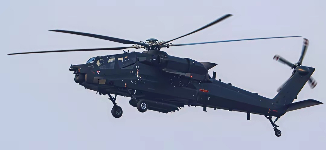 The new PLA Army Z-21 helicopter carrying external fuel tanks during a test flight